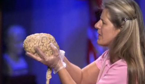 Jill Bolte Taylor holding a brain